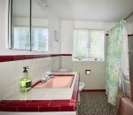 Main house full bathroom with tub/shower combo
